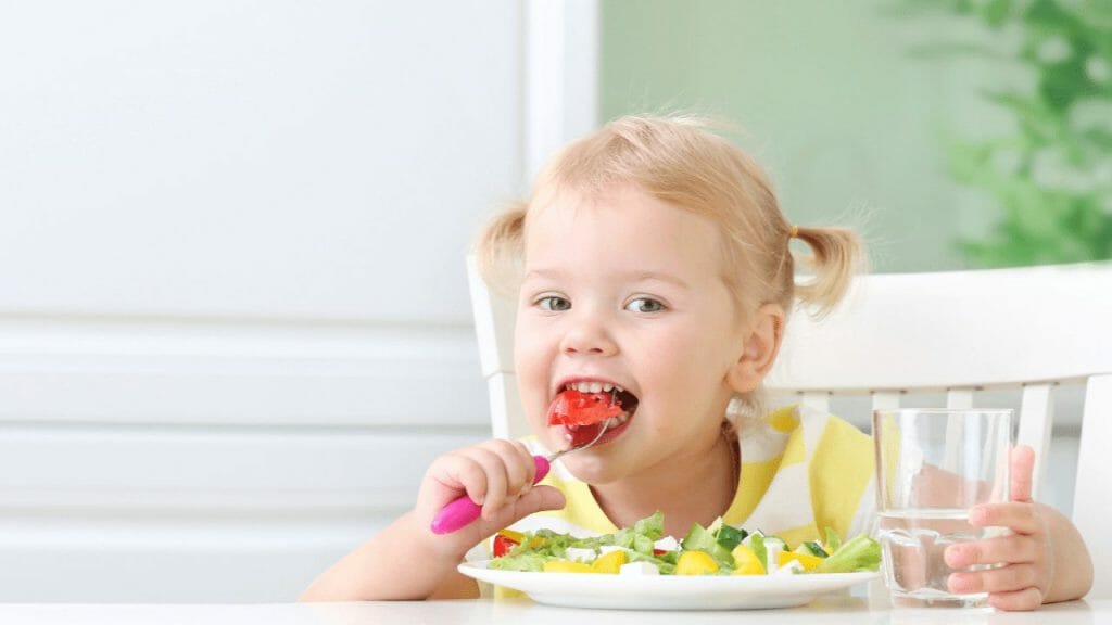 Girl eats her food