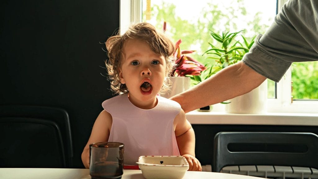 Little girl is choking on food