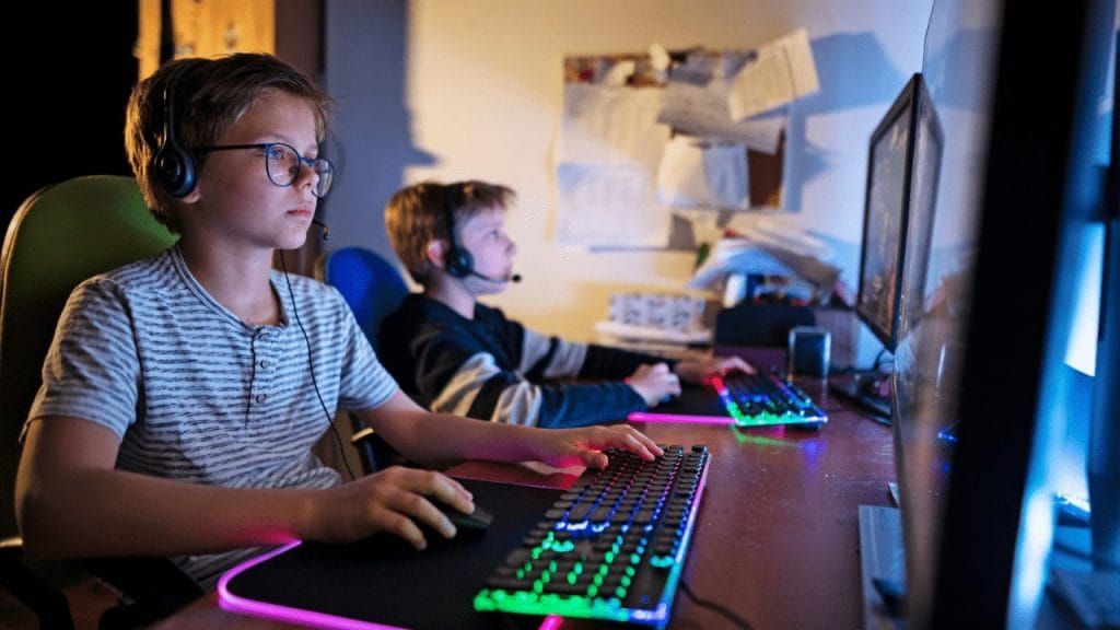 Kids in front of computer.